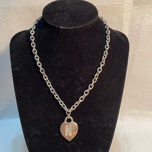 Silver tone chain necklace with sparkly ‘N’ heart pendant 16”